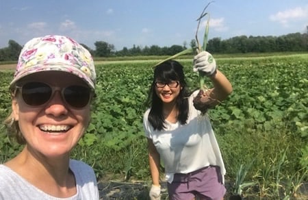 Two employees smiling at a CCC-sponsored employee event