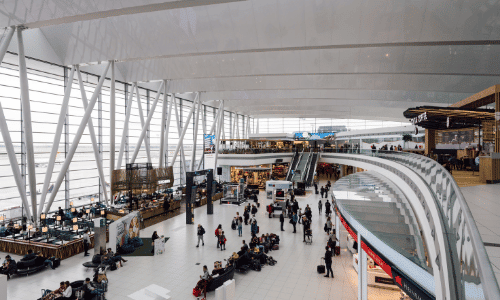 People waiting at an airport terminal