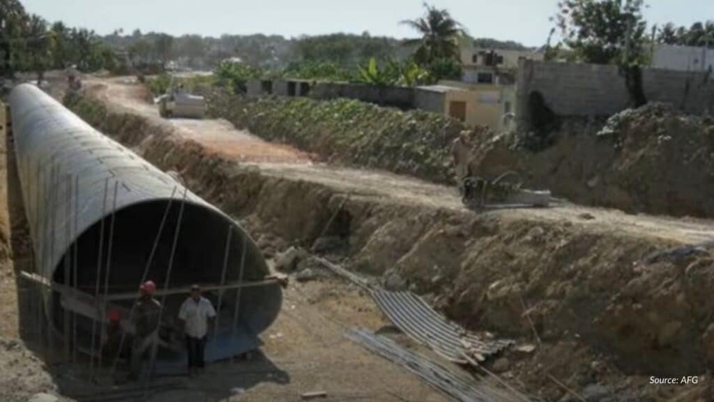 Large water pipe under construction in Caribbean or Latin America