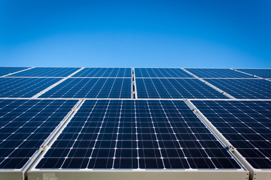 Image of solar panels with blue sky background